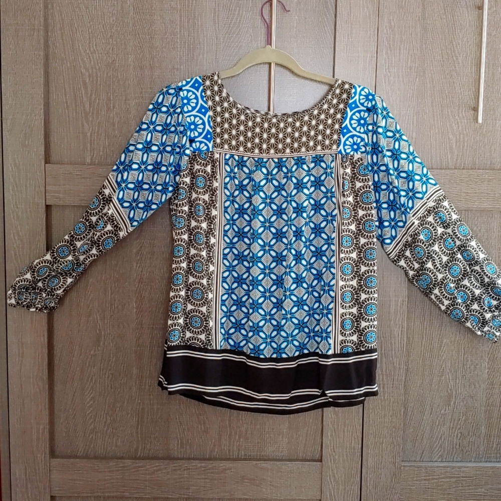Blouse with funky shapes on it